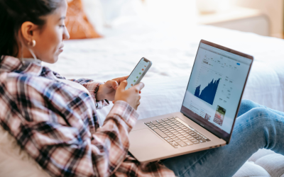 A successful female trader celebrating her achievements in the financial markets