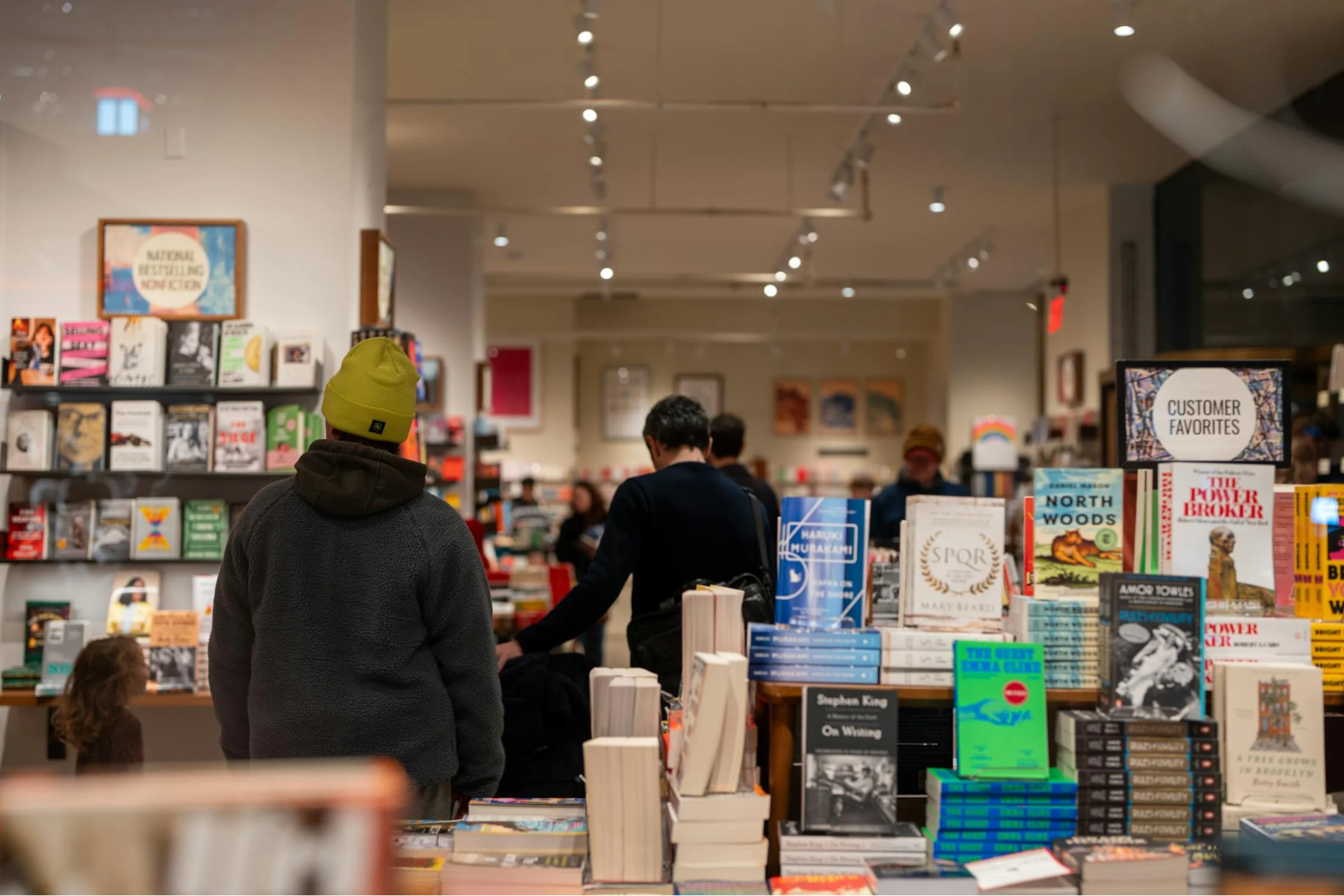 cozy bookstore interior with browsing shoppers